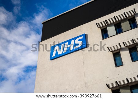 WARRINGTON, UK - MARCH 6, 2016: View of the NHS (National Health Service)  logo at the Springfields Medical Centre in the centre of Warrington, Cheshire.