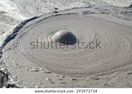 Mud volcano from Romania, refers to formations created by geo-exuded slurries (usually including water) and gases. There are several geological processes that may cause the formation of mud volcanoes.