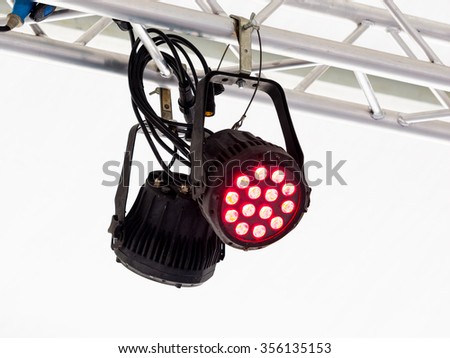 professional lighting equipment led projector suspended on an aluminum truss. White background