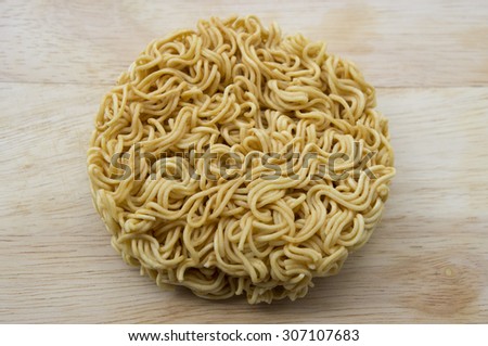 Instant noodle on wood background