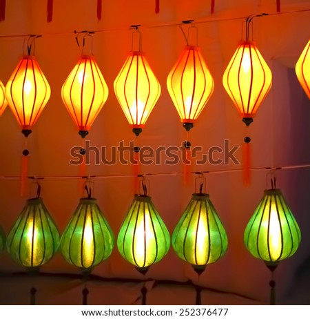 Yellow and green light lanterns