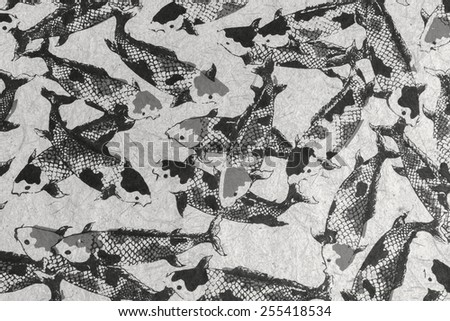 Natural paper with fish pattern closeup black and white