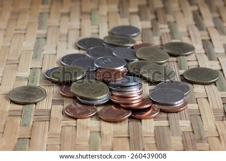 Thai Coins on the bamboo floor