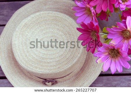 Vintage tone style hat and flower background