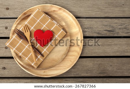 Wooden kitchenware lover concept with space on wood floor