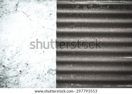 Black and white tone Old rusty metal wall with space on cement wall floor background