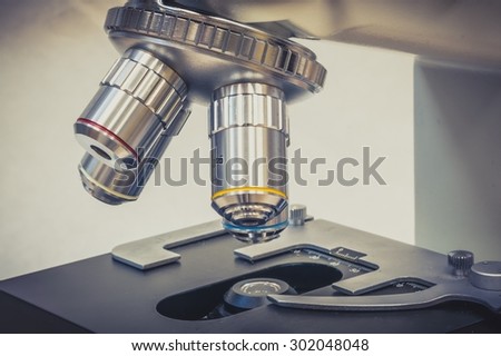 Biological microscope in scientific and healthcare research laboratory