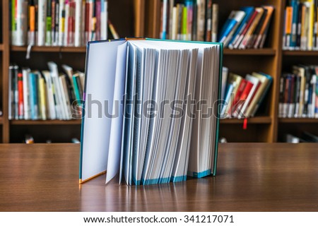 Standing book on the table in library