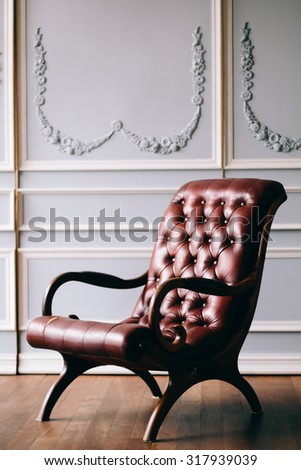 Old chair on vintage background and wooden floor - Vintage grunge empty interior