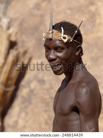 DAMARALAND, NAMIBIA, SOUTH AFRICA. 30 MARCH 2012: portrait of a man from the tribe of African Damara. The head is decorated with traditional attributes. Damara tribe lives in Namibia, South Africa.