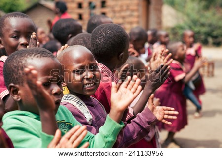 TANZANIA, AFRICA - AUGUST 2014: Children at the kindergarten playing outside, from the village of Morogoro.
