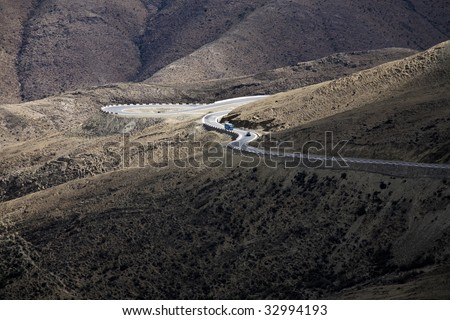 road through mountains in tibet, china