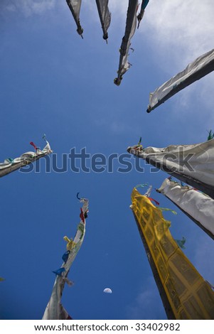 religion flags on the sky background in tibet, china