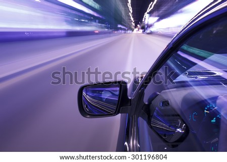 Speed driving car in the night city on the road