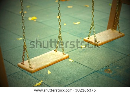 Playground swing in a park ,Vintage Style, Soft & Dreamy Effect, Low Clarity
