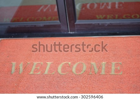 welcome mat in front of the door