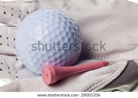 golf ball and glove isolated on a pure white background