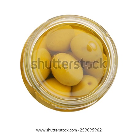 A jar of stuffed green olives isolated on a white background