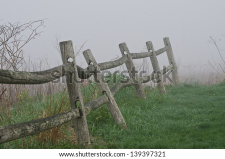Wooden Rail Fence on a Foggy Spring Morning