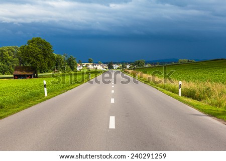 View of countryside road after thunder storm, near Schaffhausen Switzerland
