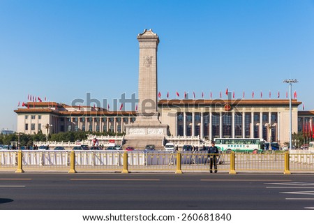 Beijing, China - October 14, 2014 - Security Guards standing on Tiananmen Square before the Monument to the People\'s Heroes and the Great Hall of the People, Beijing, China.