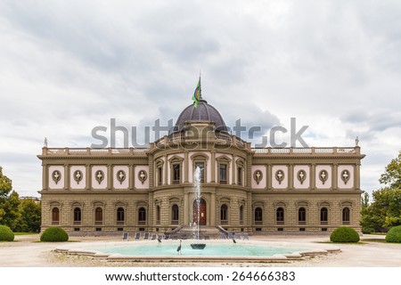 Front view of Swiss Museum of Ceramics and Glass (Museum Ariana) in Geneva, Switzerland. The museum is shaped by Neo-Classical and Neo-Baroque elements and is situated on Avenue de la Paix.
