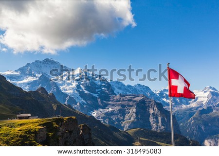 Stunning view of the Jungfrau and mountain range of Bernese alps from Mannlichen cablecar station, Switzerland.