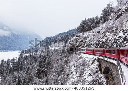 Famous sightseeing train in Switzerland, the Glacier Express in winter