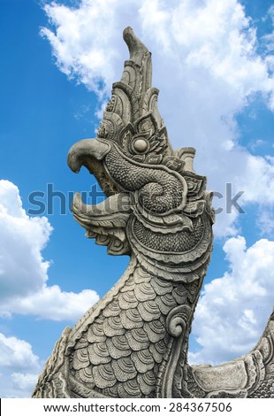 Thai dragon or king of Naga statue Arts of Buddhism in Thailand on Sky background