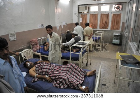PESHAWAR, PAKISTAN - MAY 14: Victim of suicide bomb blast at police school area being admitted for treatment at Lady Reading hospital, on May  14, 2011 in Peshawar.