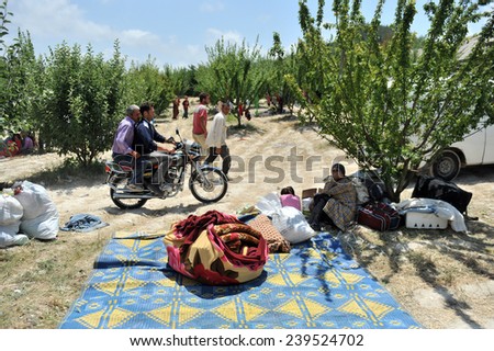 TURKISH-SYRIAN BORDER -JUNE 11, 2011: unidentified Syrian refugees, protested at the syria border   June 11, 2011 on the Turkish - Syrian border.