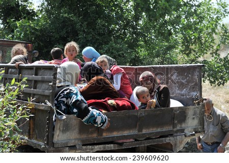 TURKISH-SYRIAN BORDER -JUNE 11, 2011: unidentified Syrian refugees,  at the syria border June 11, 2011 on the Turkish - Syrian border.