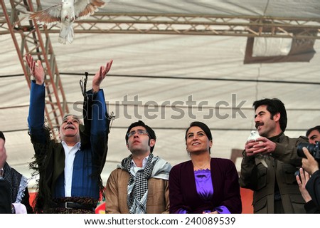 VAN,TURKEY - MARCH 20: Kurds celebrating their traditional feast Newroz that means 'new day' in kurdish on March 20, 2010 in Van, Turkey.BDP deputy Ahmet Turk, attended the ceremony.