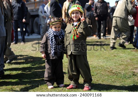 VAN,TURKEY - MARCH 20: Kurds celebrating their traditional feast Newroz that means \'new day\' in kurdish on March 20, 2010 in Van, Turkey.