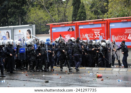 ISTANBUL, TURKEY-MAY 1: Turkish police fired water cannon and tear gas to prevent protesters from defying a ban on May Day rallies and reaching Taksim Square on May 1, 2009 in Istanbul, Turkey.