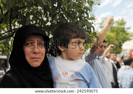 ISTANBUL, TURKEY -JUNE  07: Unidentified activists participate in a protest  organized by Humanitarian Relief Foundation to commemorate Mavi Marmara raid on  June  07,2010 in Istanbul,Turkey.