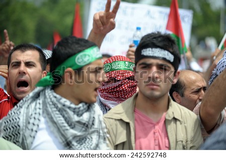 ISTANBUL, TURKEY -JUNE  07: Unidentified activists participate in a protest  organized by Humanitarian Relief Foundation to commemorate Mavi Marmara raid on  June  07,2010 in Istanbul,Turkey.