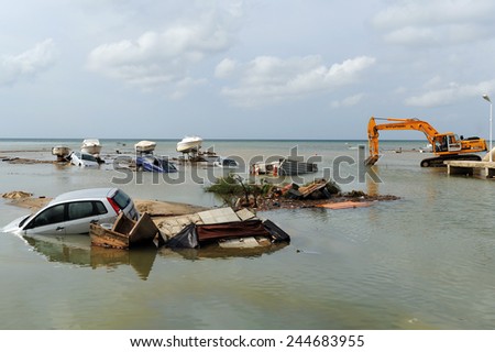 ISTANBUL, TURKEY - SEPTEMBER  09: Crashed cars in the  after flood disaster on September 09, 2009 in Istanbul, Turkey. The floods destroyed roads and houses and swept away about 200 cars.