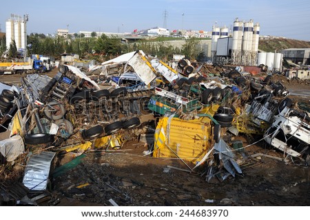 ISTANBUL, TURKEY - SEPTEMBER  09: Crashed cars in the  after flood disaster on September 09, 2009 in Istanbul, Turkey. The floods destroyed roads and houses and swept away about 200 cars.