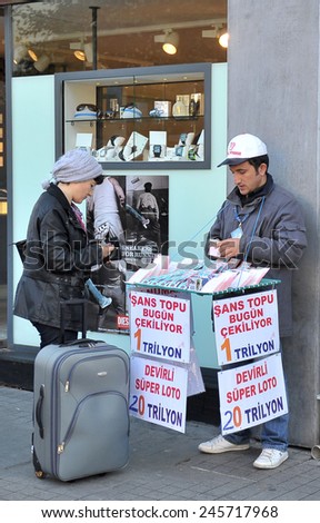 ISTANBUL, TURKEY - DEC 8, 2010: Lottery ticket seller. Established in 1939, the National Lottery in Turkey in the country, has been organizing all kinds of games of chance. Dec 8, 2010