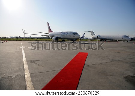ISTANBUL,  TURKEY  - APRIL  5:   Turkish Airlines plane in front of the red carpet before the case. on April  5 2010 Turkish Airlines is one of the largest airlines in the Middle East