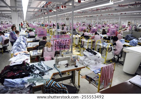 ISTANBUL, TURKEY - APRIL 24, 2011: unidentified workers are working in a textile factory on April 24, 2011 Istanbul,Turkey