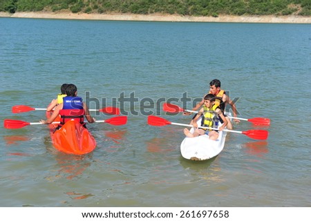 ISTANBUL ,TURKEY - JULY 14: Canoeing lesson students at scout camp on July 14, 2012 in Istanbul, Turkey.