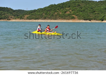 ISTANBUL ,TURKEY - JULY 14: Canoeing lesson students at scout camp on July 14, 2012 in Istanbul, Turkey.