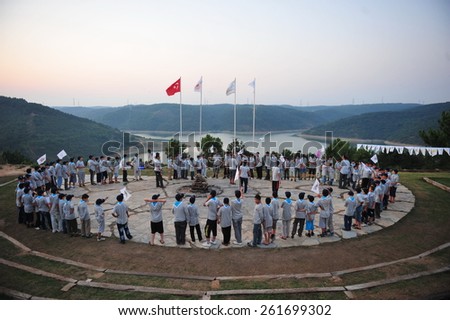 ISTANBUL ,TURKEY - JULY 14: Campfire burning scouts at scout camp on July 14, 2012 in Istanbul, Turkey.