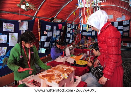 VAN, TURKEY - JAN 22:  Earthquake victim people in the tent city.  at the earthquake of Van-Ercis on January  22, 2012 in Van, Turkey.