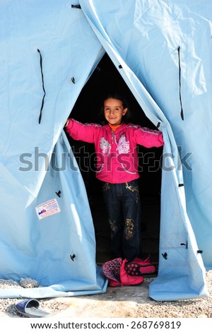 VAN, TURKEY - JAN 22:  Earthquake victim people in the tent city.  at the earthquake of Van-Ercis on January  22, 2012 in Van, Turkey.