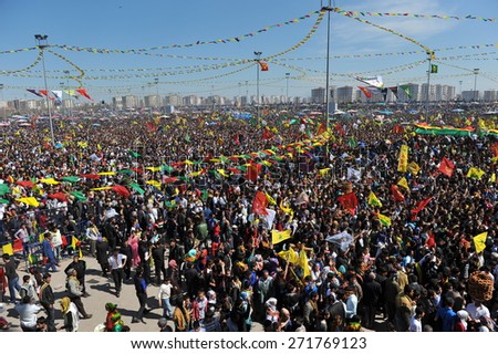 DIYARBAKIR,TURKEY - MARCH 21: Kurds celebrating their traditional feast Newroz that means \'new day\' in kurdish on March 21, 2014 in Diyarbakir, Turkey.
