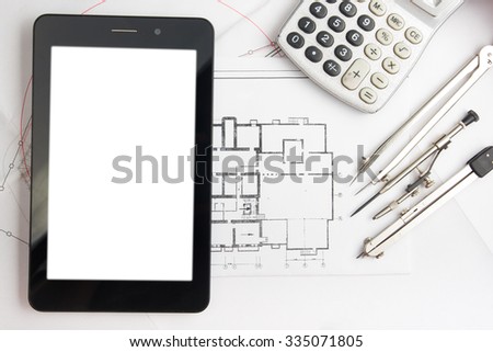 Workplace of architect - Architectural project, blueprints and tablet, calculator, divider compass on plans. Engineering tools view from the top. Construction background. Copy space for text.