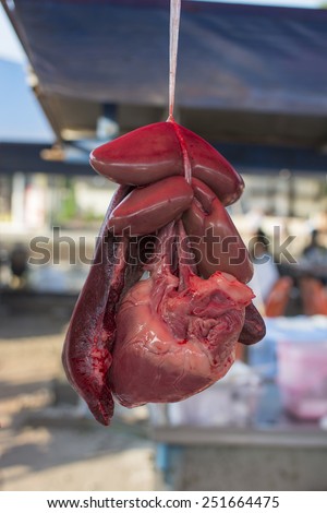 internal organs of the pig on the shop at the market